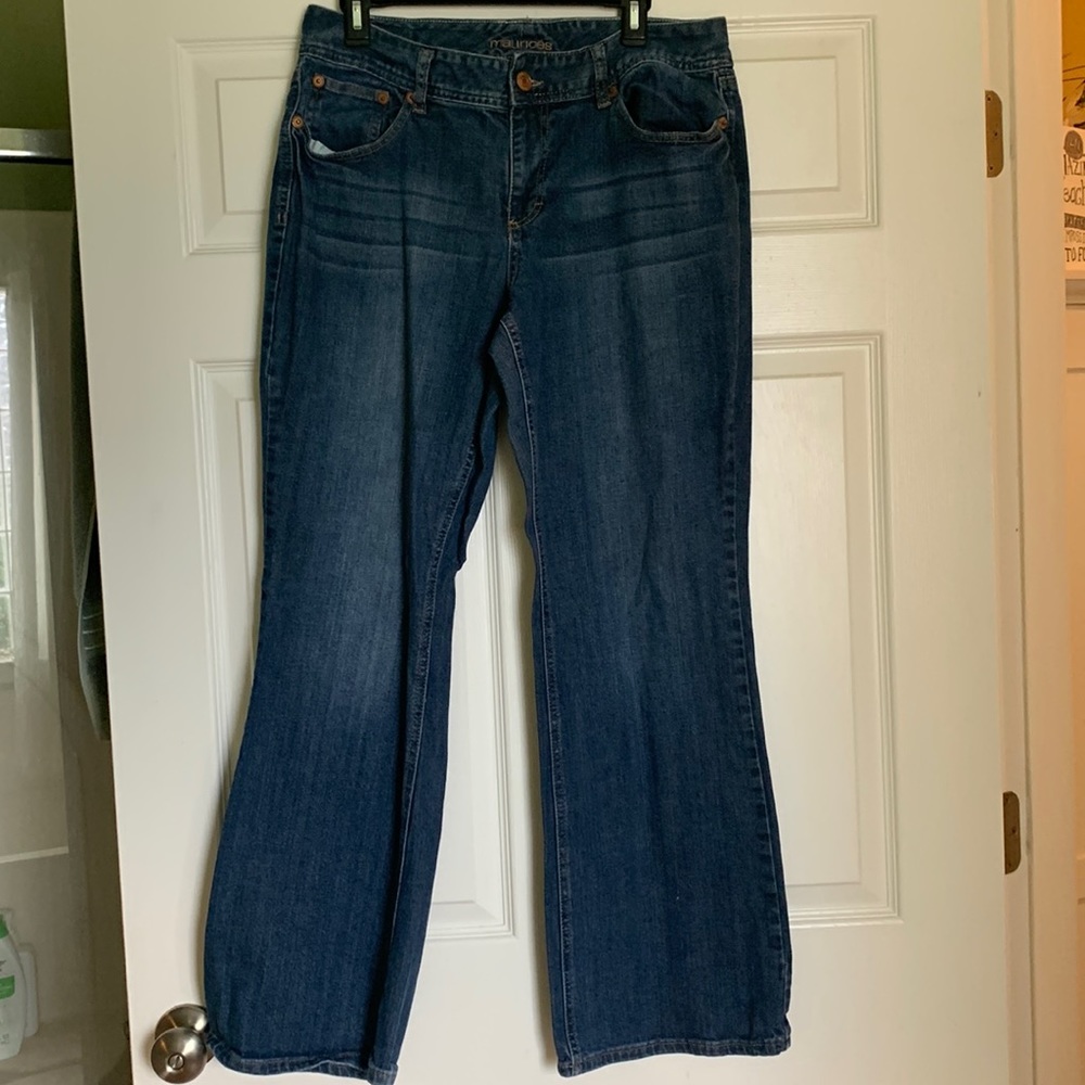 Maurices dark blue, boot cut jeans. Regular length. No stains.